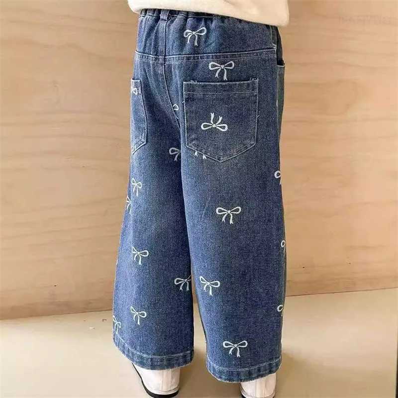 Spring and Autumn Childrens Pocket Wide Leg Jeans Comparison Loose Printed Bow Pants Boys and Girls Jeans Baby Children Trousers 2-7YT250326