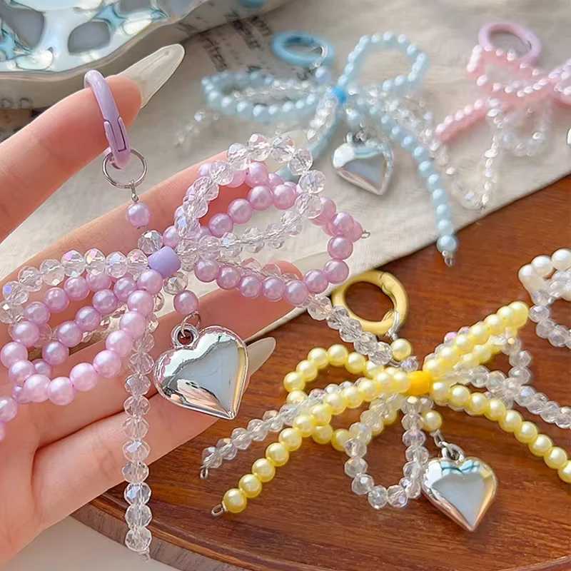 Handmade Delicate Beaded Key Chain Pearl Bow Shaped Pendant Keyring Heart Keychain Ornament Pearl Decoration For Bags PhonesXJ250319