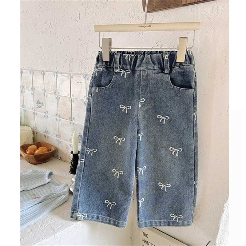 Spring and Autumn Childrens Pocket Wide Leg Jeans Comparison Loose Printed Bow Pants Boys and Girls Jeans Baby Children Trousers 2-7YT250326