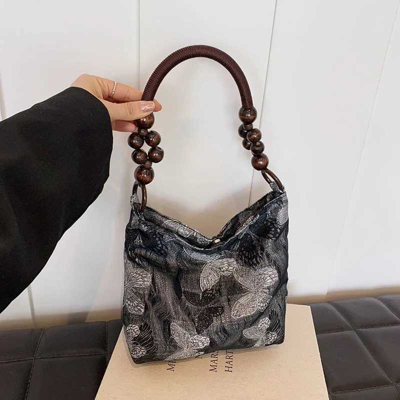 Summer versatile high-end niche underarm bag for women 2025 new style new Chinese tote handbag with bamboo joints Y250319
