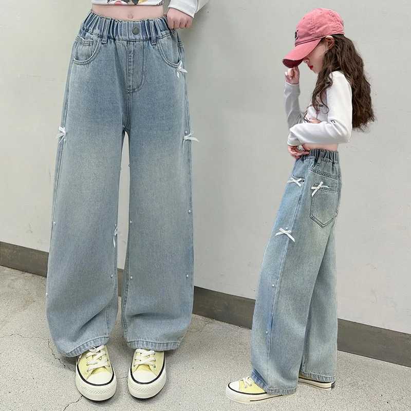 Childrens fashionable jeans with bow suitable for girls Spring Festival jeans casual light blue jeans for teenagers and children Trouser with pearlsT2