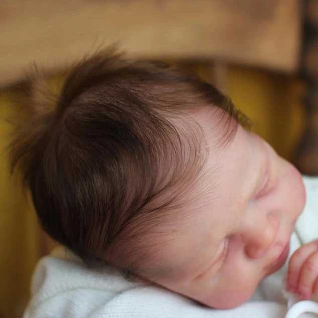 NPK 19 inch has been painted as a regenerated sleep baby doll the same as in the picture with a soft lifespan 3D skin touch and visible hair roots W25