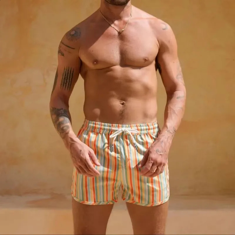 Mens sports and leisure beach pants polyester woven quick drying shorts printed singlelayer mens European American 2024 edition 250312