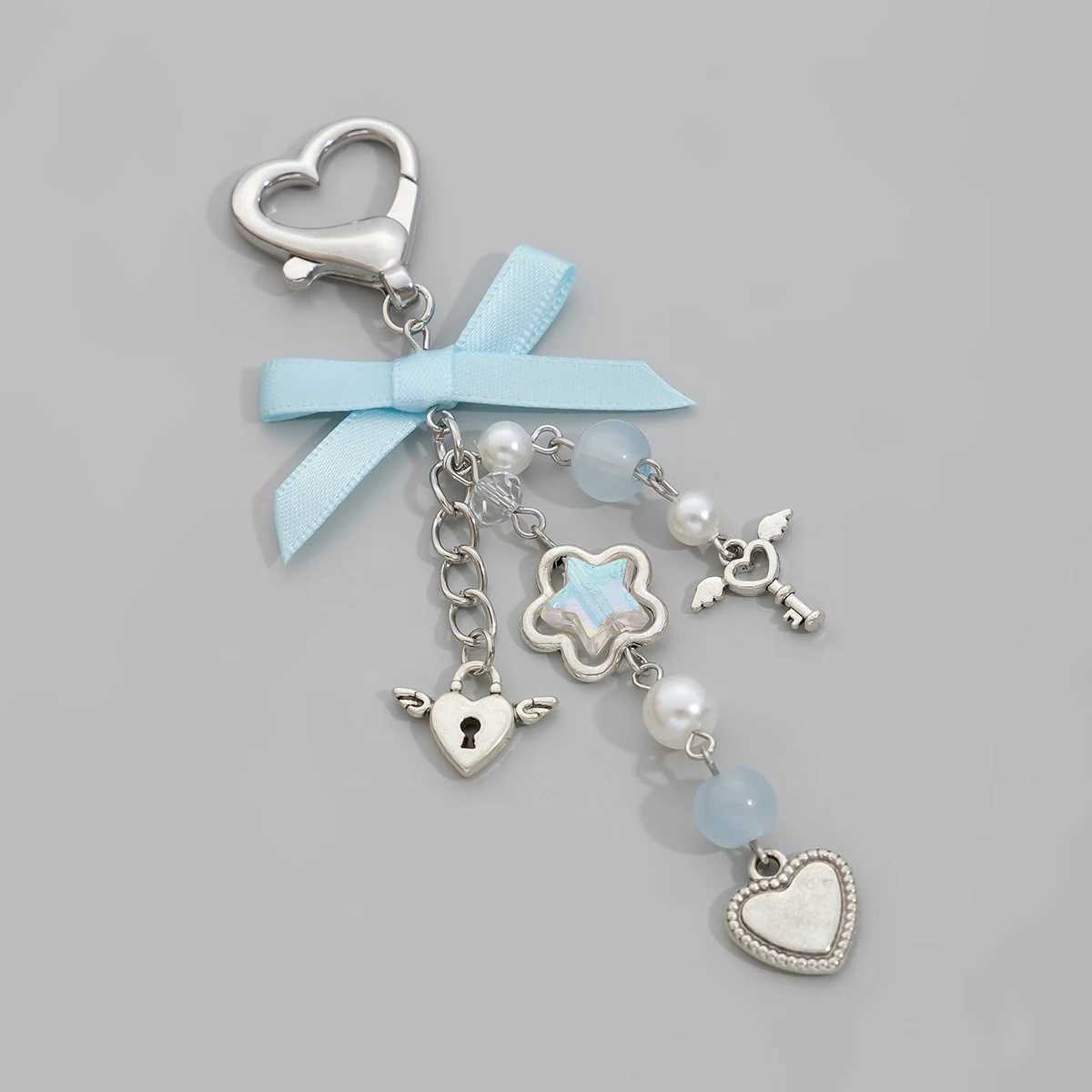 IngeSight. Z Sweet and Cute Blue Bow Star Charm Keychain Womens Fashion Imitation Pearl Love Pendant Keychain JewelryXJ250319