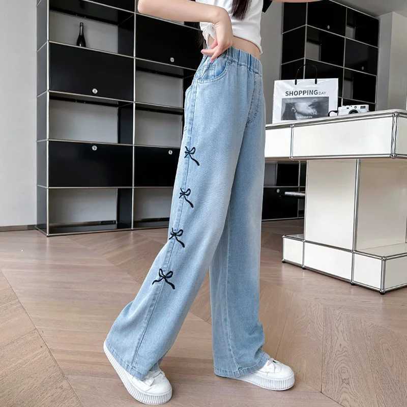 2024 Summer New Girls and Childrens Thin Bow Strap Tight Jeans Wide Leg Pants and Fashionable Elastic Waist DesignT250326