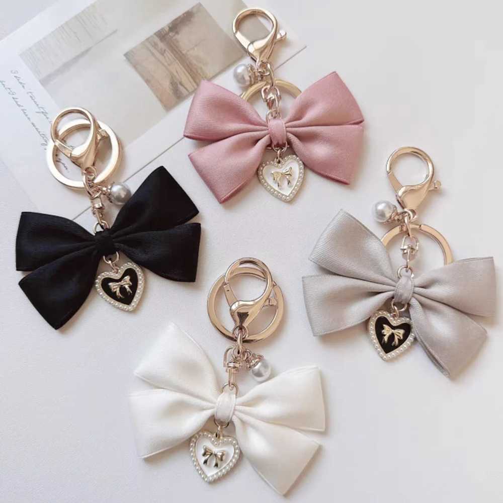 Simulated Pearl Keychain Sweet Fashion Ribbon Bow Keychain Accessories Metal Buckle Womens Bag Charm Best Jewelry GiftXJ250319