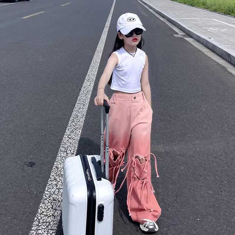 Girl pink jeans Korean heart-shaped hollow bag bandage denim Trouser childrens wide jeans retro fashion version clothingT250326