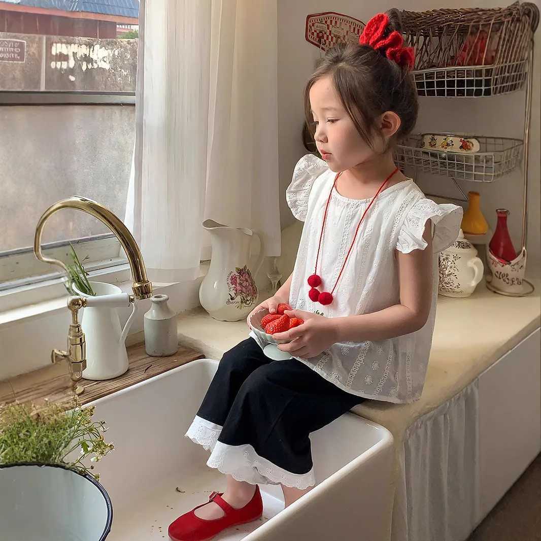 Girls summer lotus leaf lace short sleeved T-shirt suitable for children white childrens clothing toddler clothing baby clothingT250320
