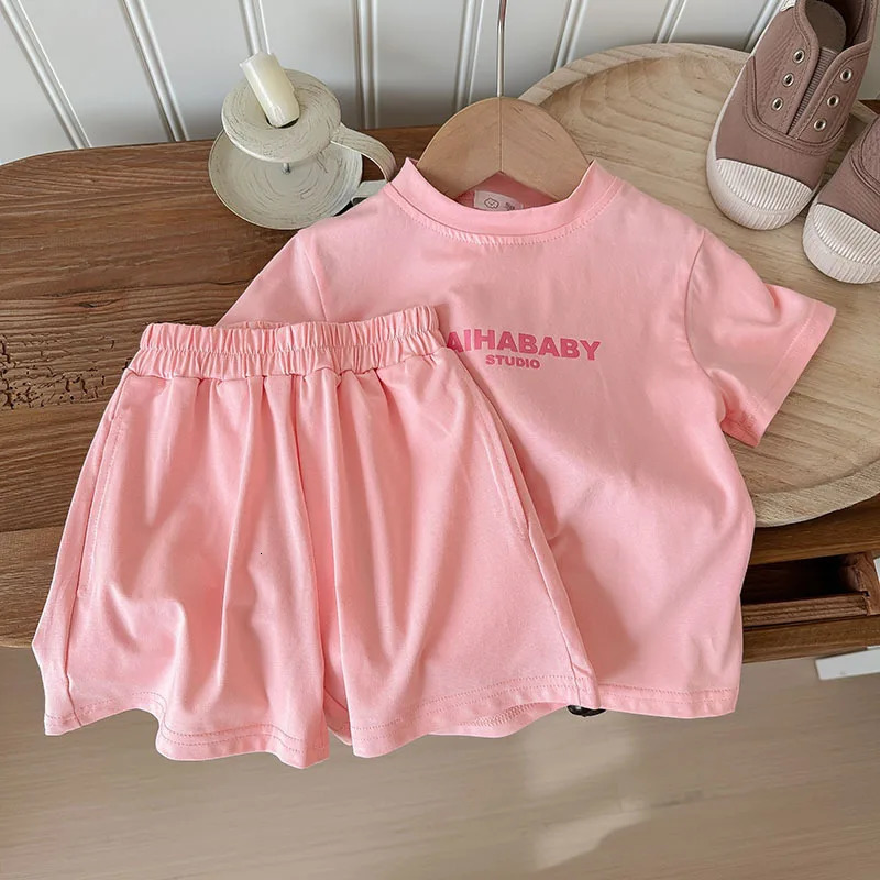 Summer baby girl sportswear set solid color letter printed Tshirtshorts 2PCS suitable for 210 year old boys casual wear 250319