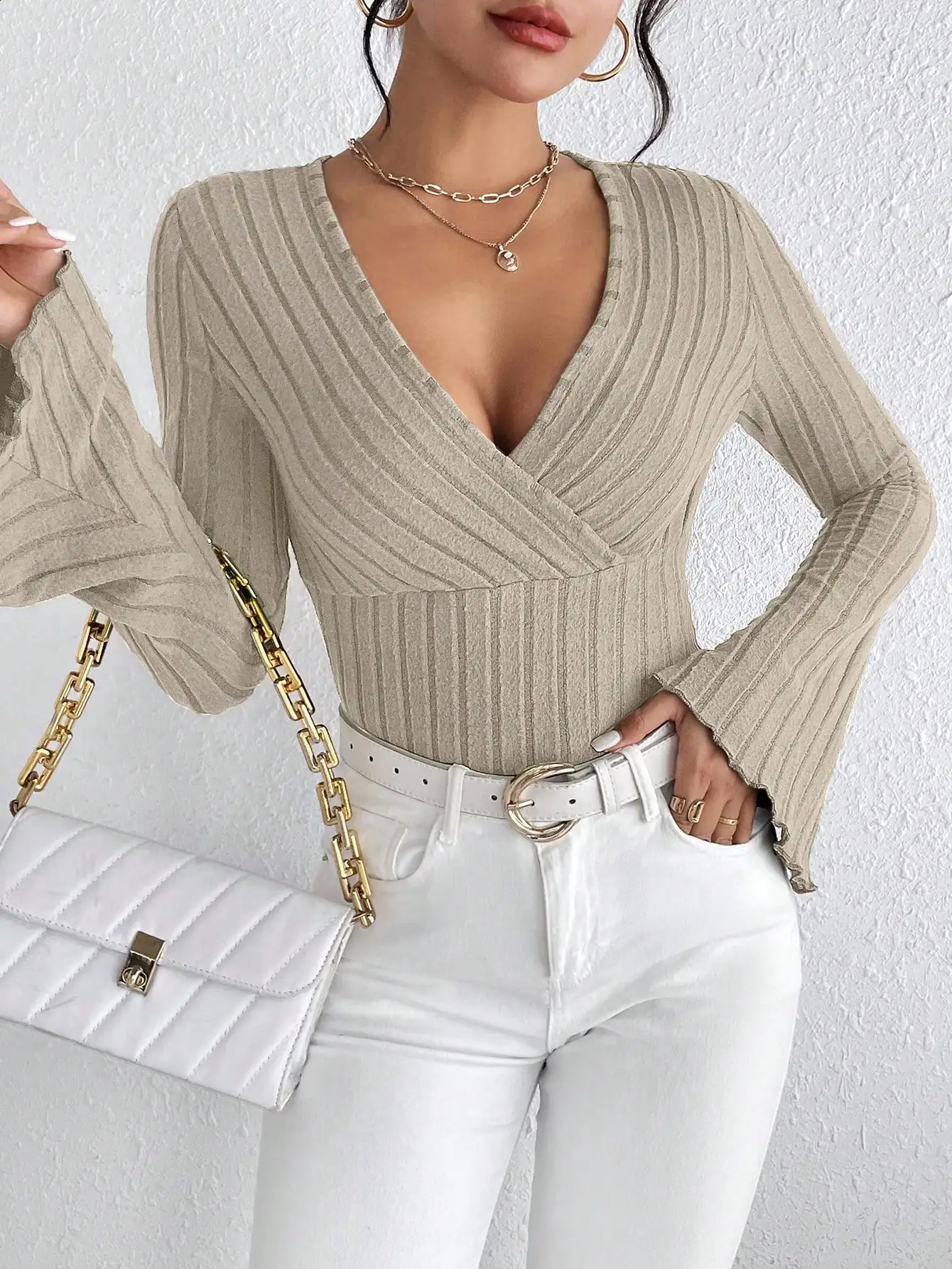 Womens autumn and winter long sleeved top V-neck sexy slim striped womens top long sleeved knitted bottom shirt 250314