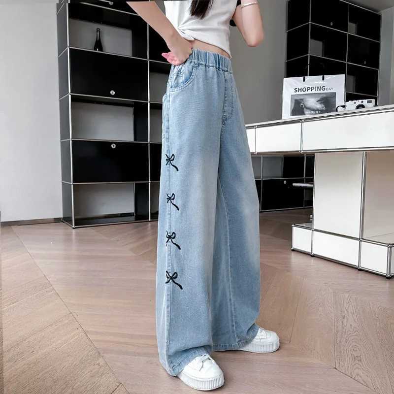 2024 Summer New Girls and Childrens Thin Bow Strap Tight Jeans Wide Leg Pants and Fashionable Elastic Waist DesignT250326