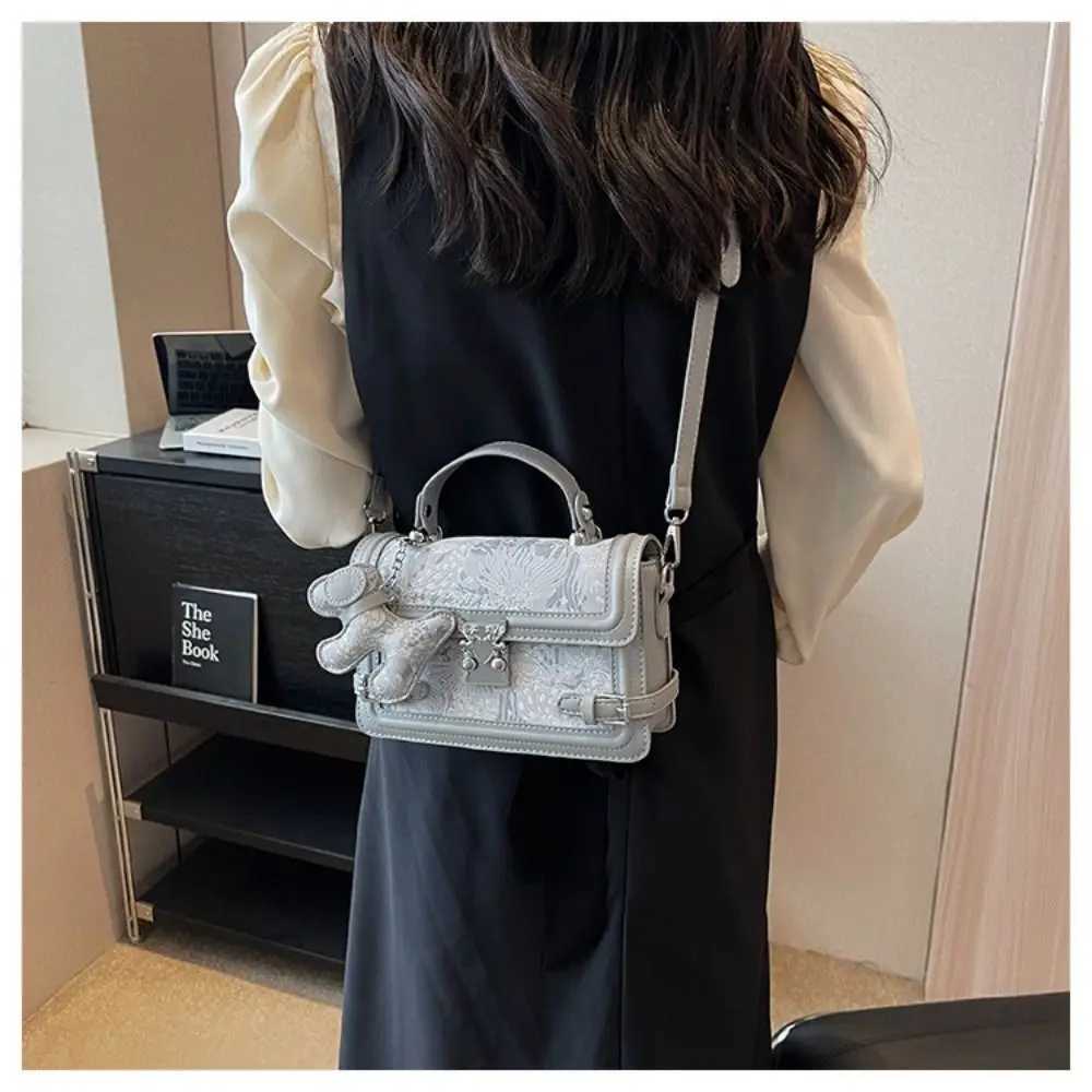 Elegant embossed shoulder bag with metal buckle square bottom bag and exquisite cross shaped body bag Y250319