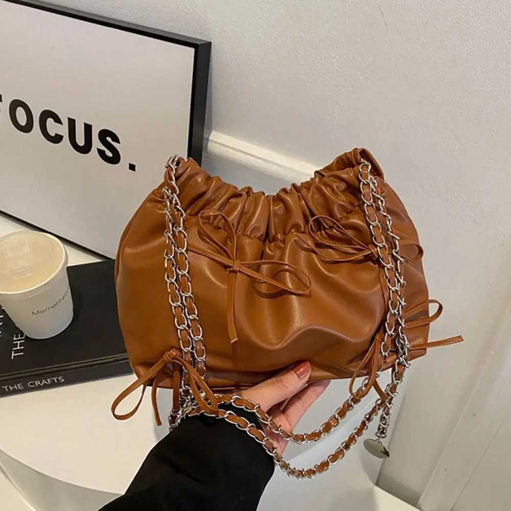Womens shoulder bag single-sided pleated design handbag PU leather plain weave bag womens small casual plain weave bucket bag Y250319