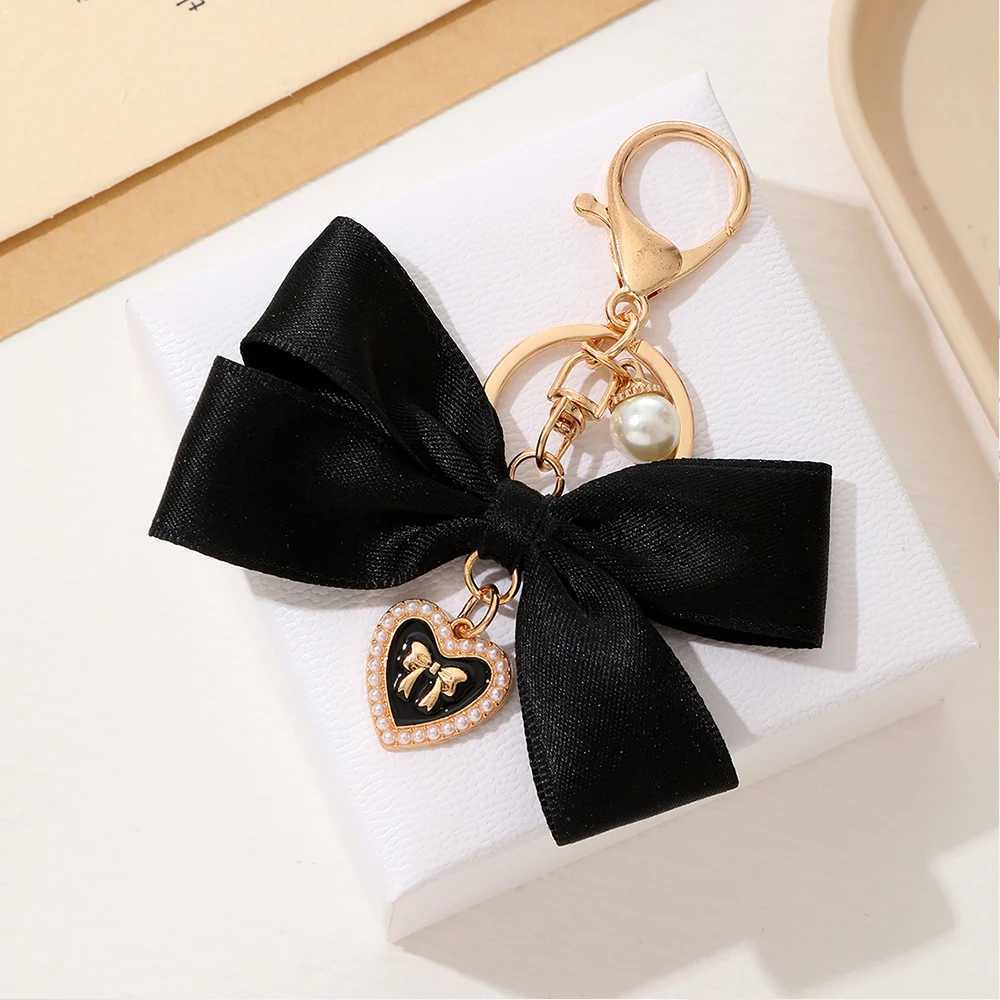 Simulated Pearl Keychain Sweet Fashion Ribbon Bow Keychain Accessories Metal Buckle Womens Bag Charm Best Jewelry GiftXJ250319