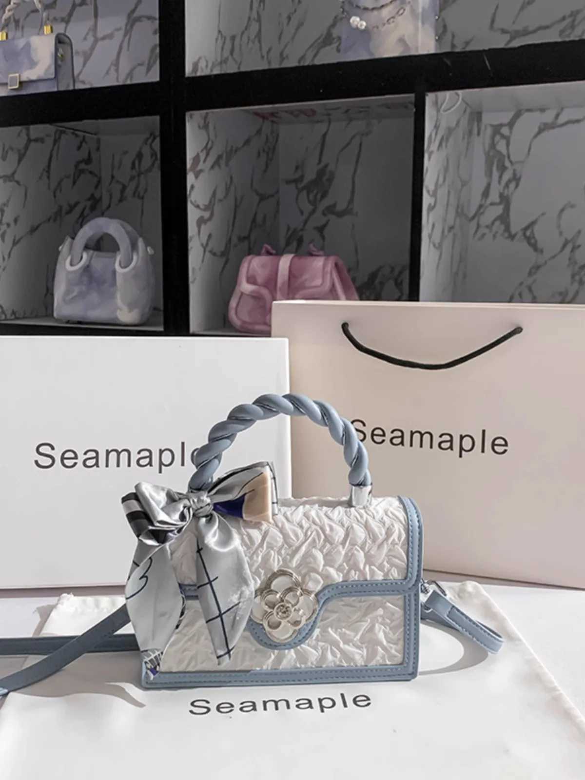 Square handbags contrasting colors and exquisite floral metal decorative shoulder messenger bags for the new fashion trend of 2024 Y250319