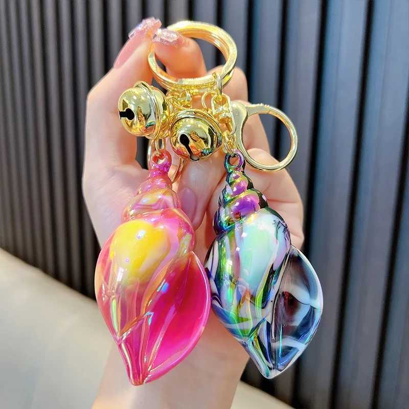 Electroplated colored Conch keychain suitable for women cute car keychain used for wallets backpacks bags charms acrylic keychains with lobster claspX