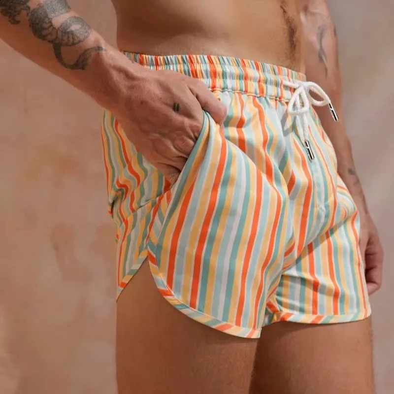 Mens sports and leisure beach pants polyester woven quick drying shorts printed singlelayer mens European American 2024 edition 250312