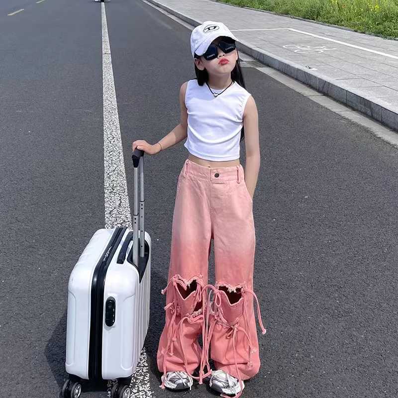 Girl pink jeans Korean heart-shaped hollow bag bandage denim Trouser childrens wide jeans retro fashion version clothingT250326