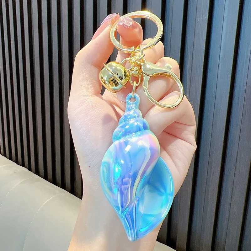 Electroplated colored Conch keychain suitable for women cute car keychain used for wallets backpacks bags charms acrylic keychains with lobster claspX