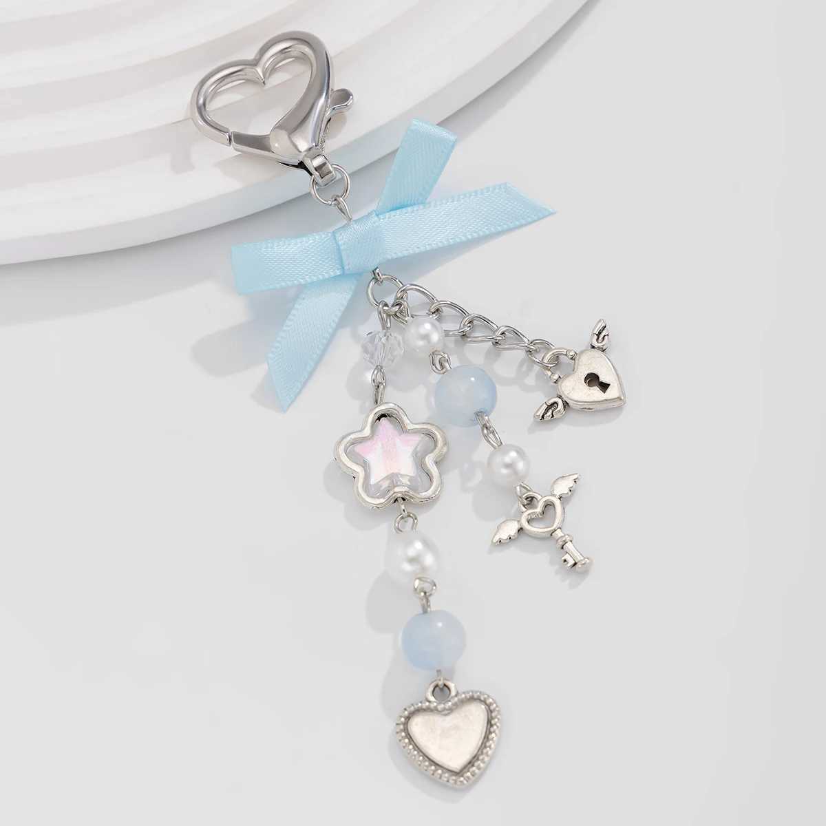 IngeSight. Z Sweet and Cute Blue Bow Star Charm Keychain Womens Fashion Imitation Pearl Love Pendant Keychain JewelryXJ250319