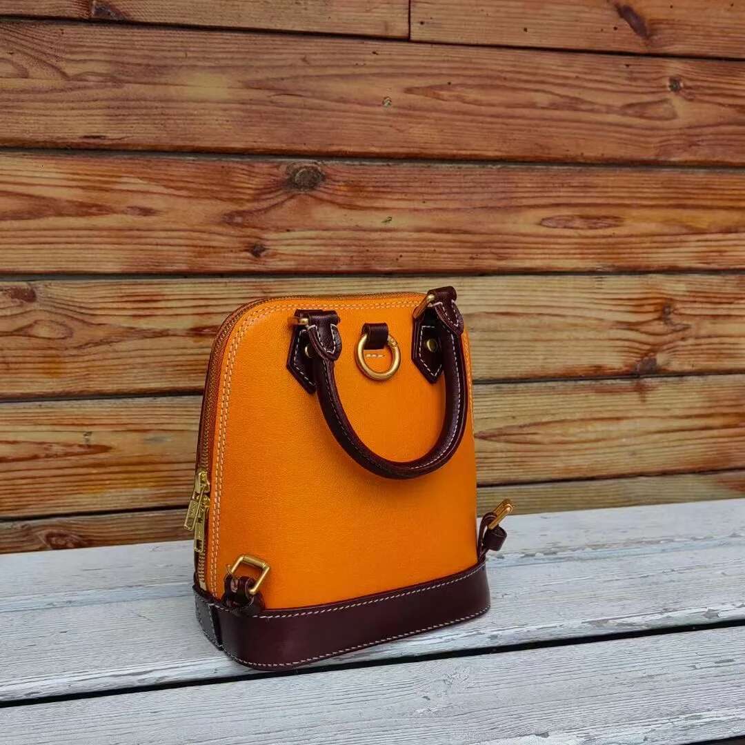 Italy Imported Cowhide Small Backpack Handbag
