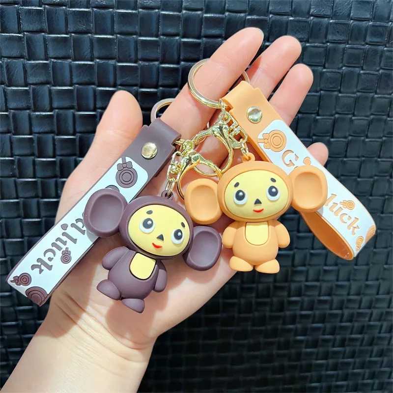 Cheburashkas monkey keychain cartoon animal doll car keychain backpack pendant decoration childrens education Christmas giftXJ250319