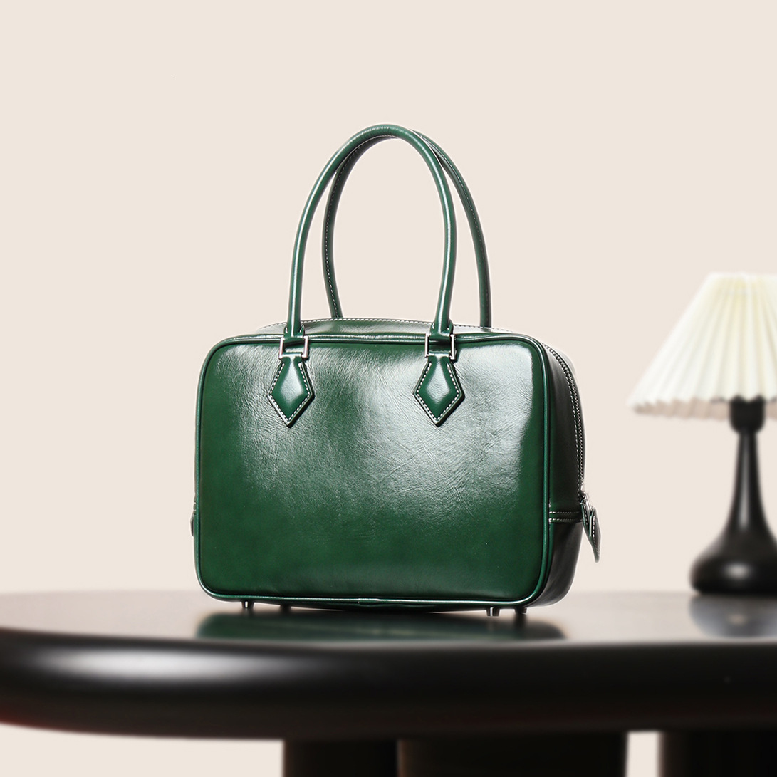 New Genuine Women S Top Layer Cowhide Bowling Ball Swift Leather Hand Held Small Square Bag Feather Bag Shoulder Bags