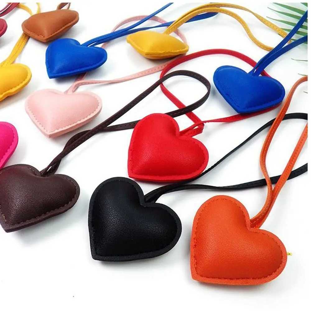 Multi colored PU leather heart-shaped keychain car keychain love PU leather clothes hanger cartoon fashion bag pendant bag decorationXJ250319