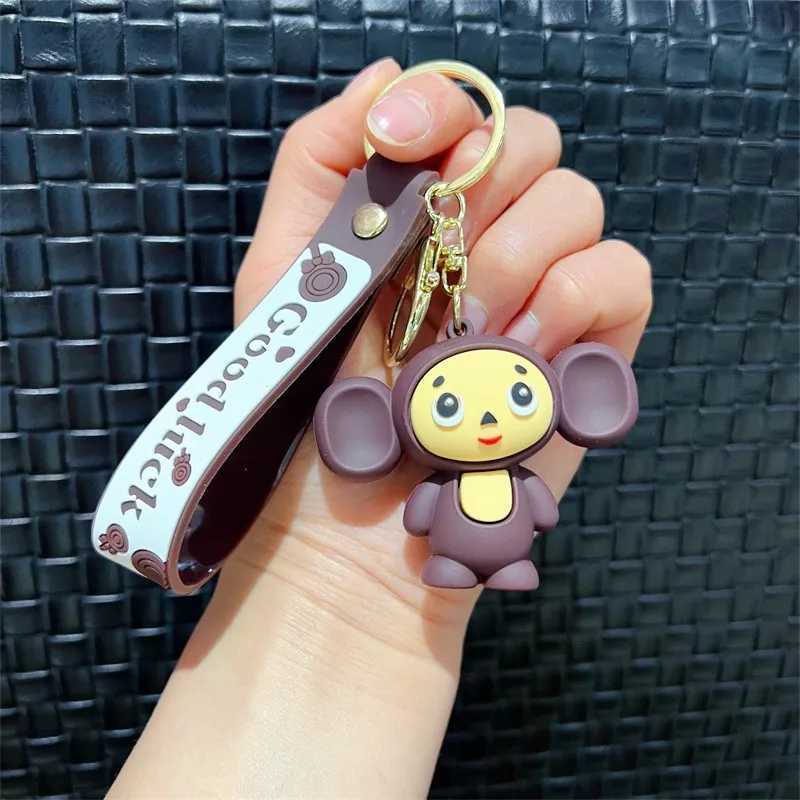 Cheburashkas monkey keychain cartoon animal doll car keychain backpack pendant decoration childrens education Christmas giftXJ250319