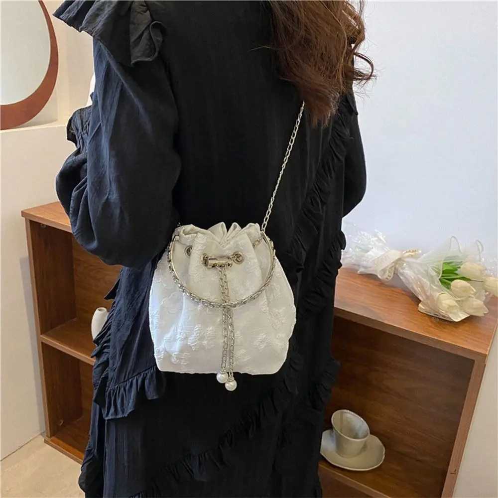 Fashionable shoulder bag fashionable round handheld chain dry bucket bag pleated floral design exquisite cross shaped bag for women Y250319