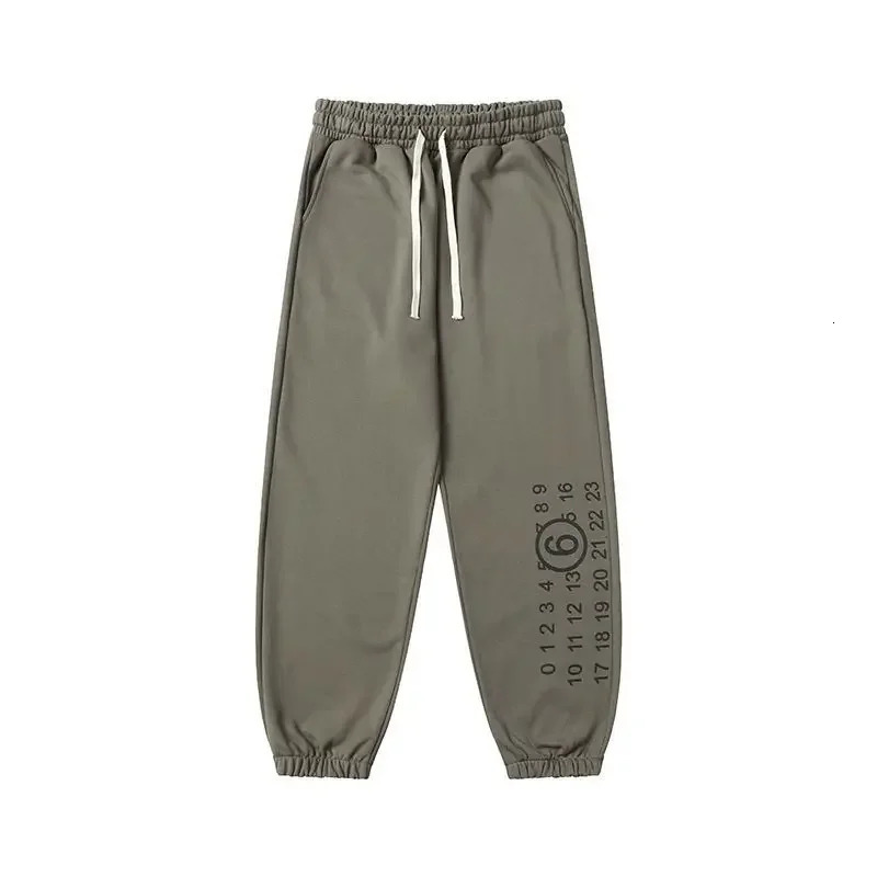 Spring and Autumn MM6 Letter Printed Tight Pants Loose Casual Dragging Mens Womens Sweatpants Thin Inner 250320