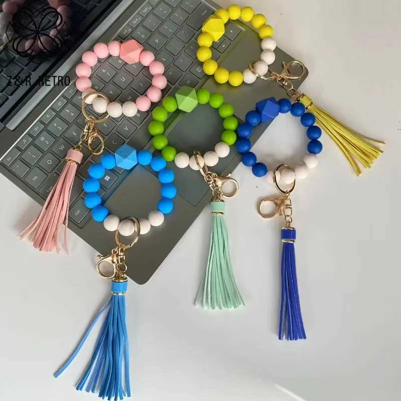 SilICONe Beads Key Chains With Tassel Wood Beads Keyring Multicolor Keychain Mobile Phone Wholesale Customized OrderXJ250319