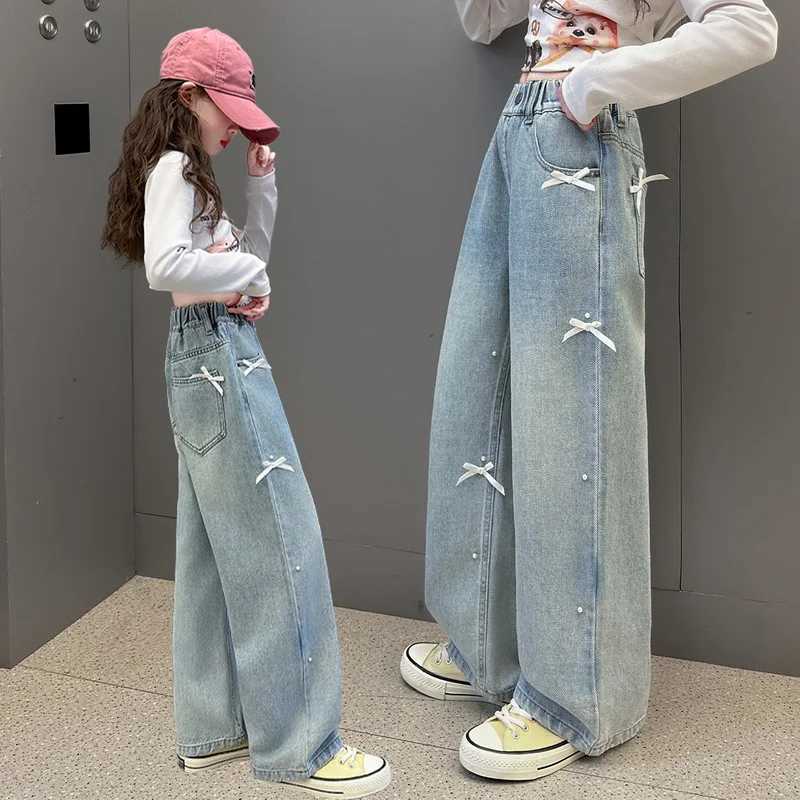 Childrens fashionable jeans with bow suitable for girls Spring Festival jeans casual light blue jeans for teenagers and children Trouser with pearlsT2