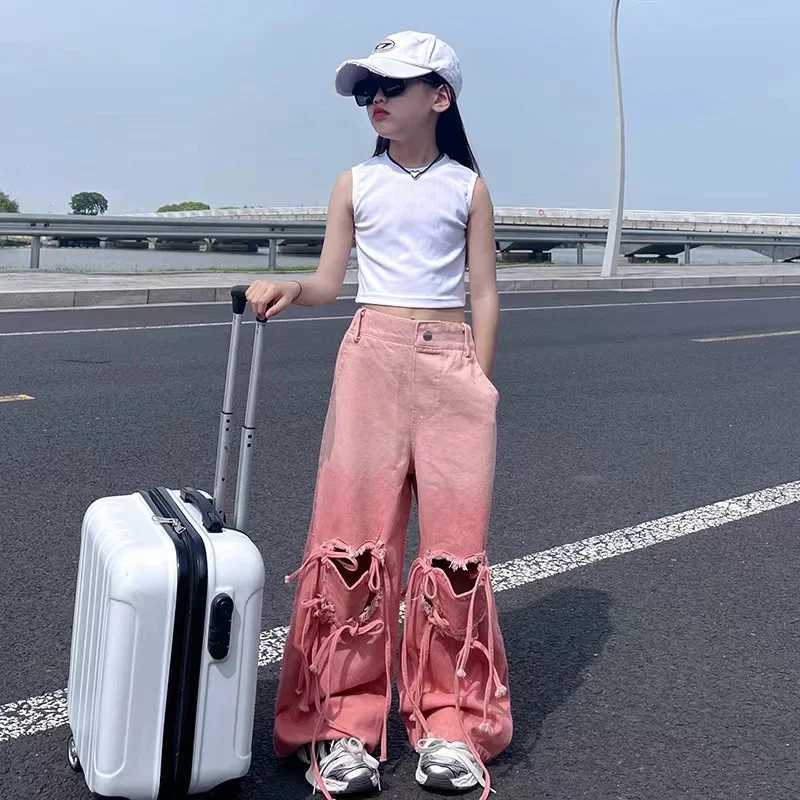 Girl pink jeans Korean heart-shaped hollow bag bandage denim Trouser childrens wide jeans retro fashion version clothingT250326
