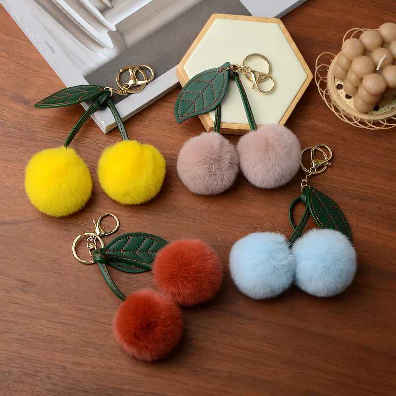 New Water Otter Rabbit Hair Cherry Multi Color Car Keychain Pendant Cute Pong Doll Bag Hanging KeychainXJ250319