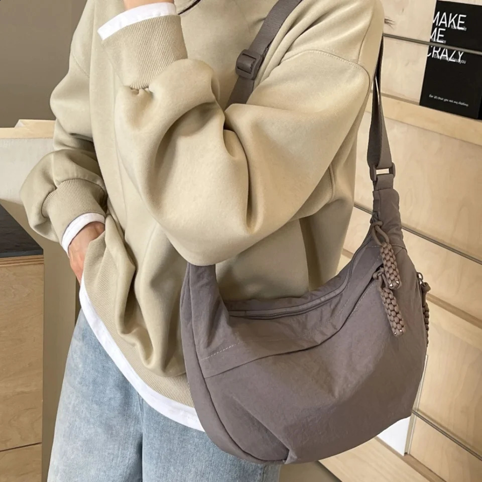 canvas cross body bag with large capacity simplified shoulder from Korea lightweight solid color garbage for travel 250317