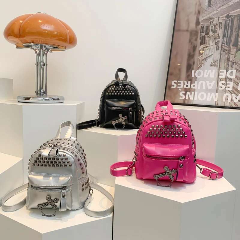 2025 New Free Shipping Light Luxury Women's Fashion Rock Backpack High Quality Design Handbag Rivet Punk Youth Backpack Computer Bag Backpack Out