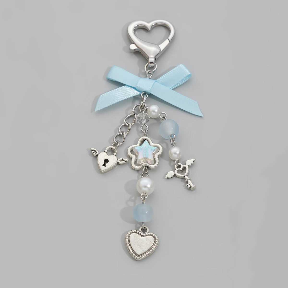 IngeSight. Z Sweet and Cute Blue Bow Star Charm Keychain Womens Fashion Imitation Pearl Love Pendant Keychain JewelryXJ250319