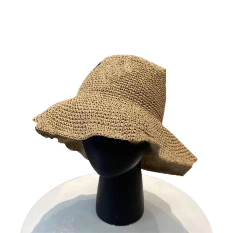 2025 New Designer Hat Summer Grass Weaving Countryside Style Hollow Weaving Designer Hat Tourism Vacation Sunscreen Fashion Fishing Hat Big Eaves Hat 7A