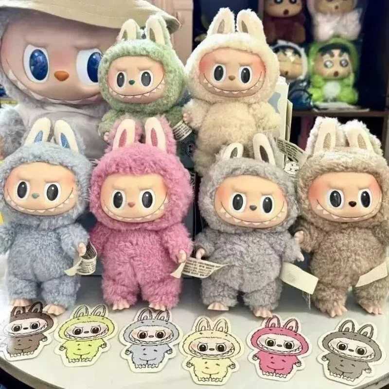 1 1. High quality Kawaii Monster Labubu Blind Box Series PVC Labubu Macaron Pendant Doll Monster Keychain Birthday Holiday Childrens GiftXJ250319