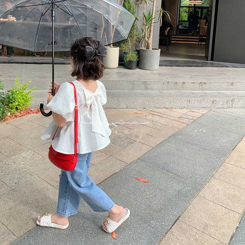 Summer girls short sleeved sweet square neckline bubble backless big bow fashion version short sleeved shirt childrens clothingT250320