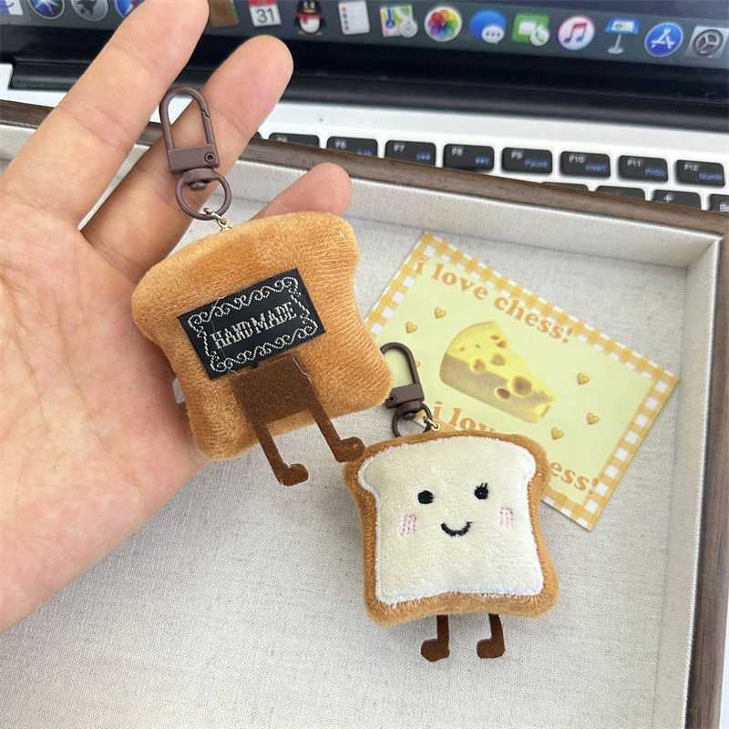 1 Japanese popular cute keychain cute yellow noodle bun toast plush pendant keychain creative expression exquisite presentationXJ250319