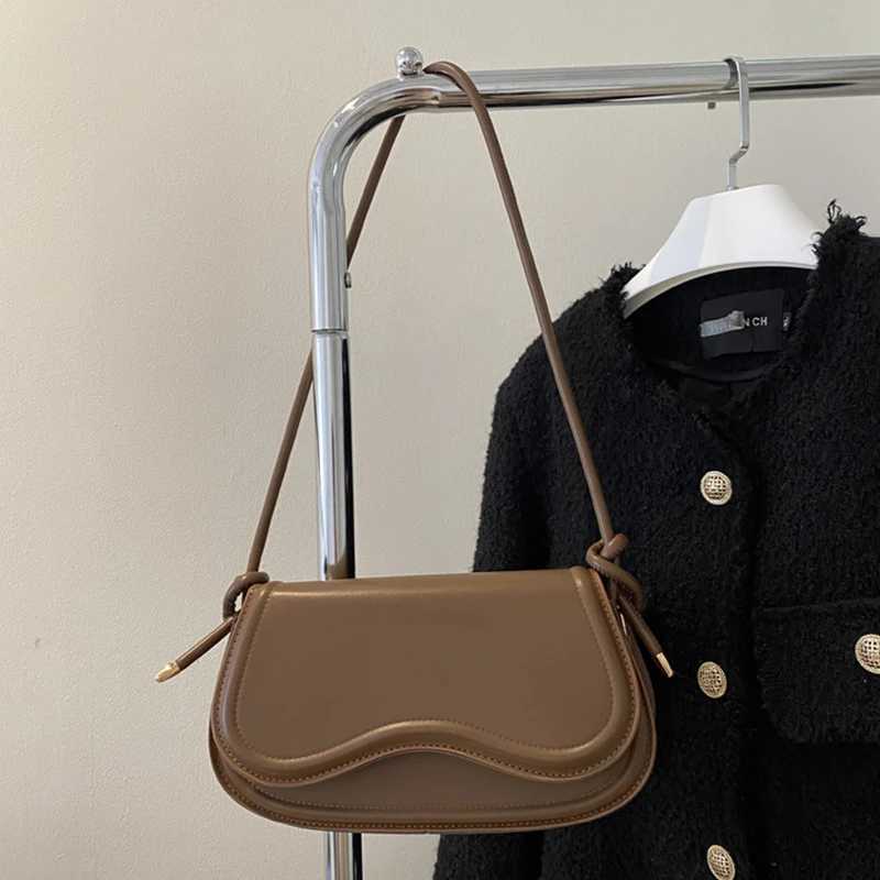 Fashion saddle bag simple casual cross shaped bag womens shoulder bag Y250319