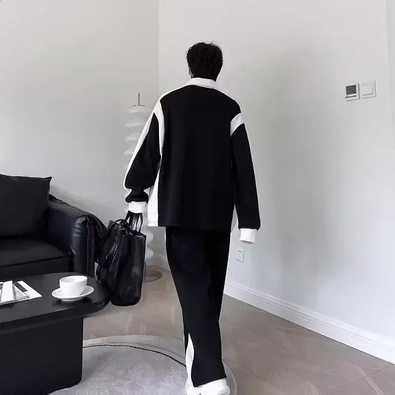 High end black and white splicing contrasting color sports long sleeved set twopiece pants casual mens wear 250319