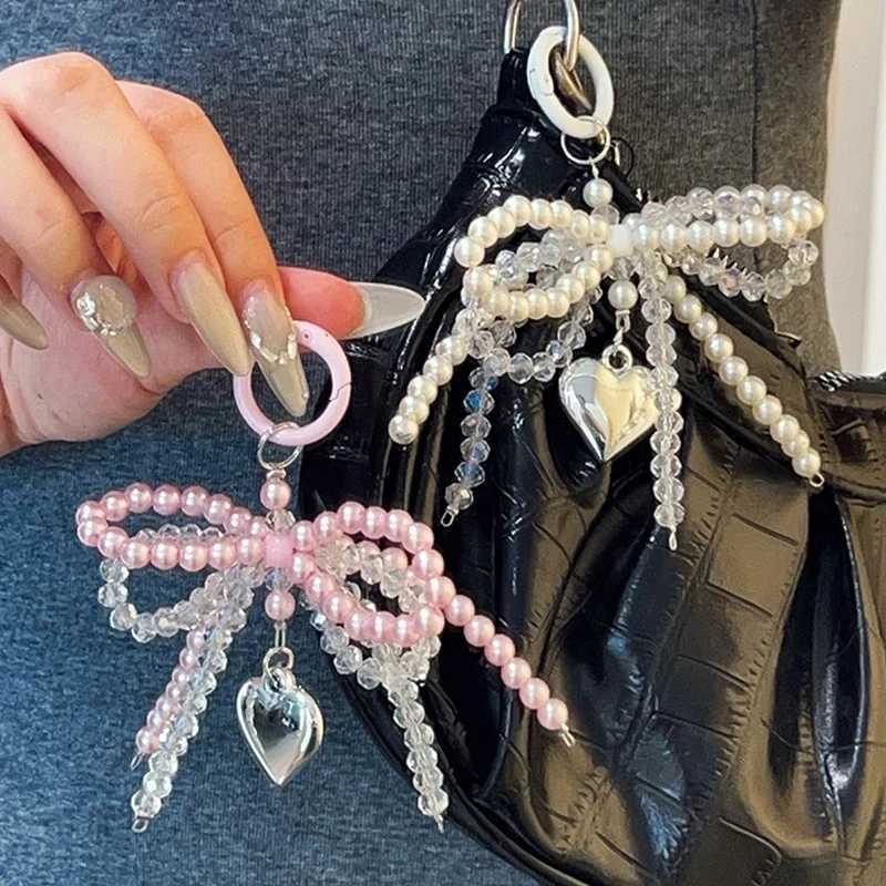 Handmade Delicate Beaded Key Chain Pearl Bow Shaped Pendant Keyring Heart Keychain Ornament Pearl Decoration For Bags PhonesXJ250319
