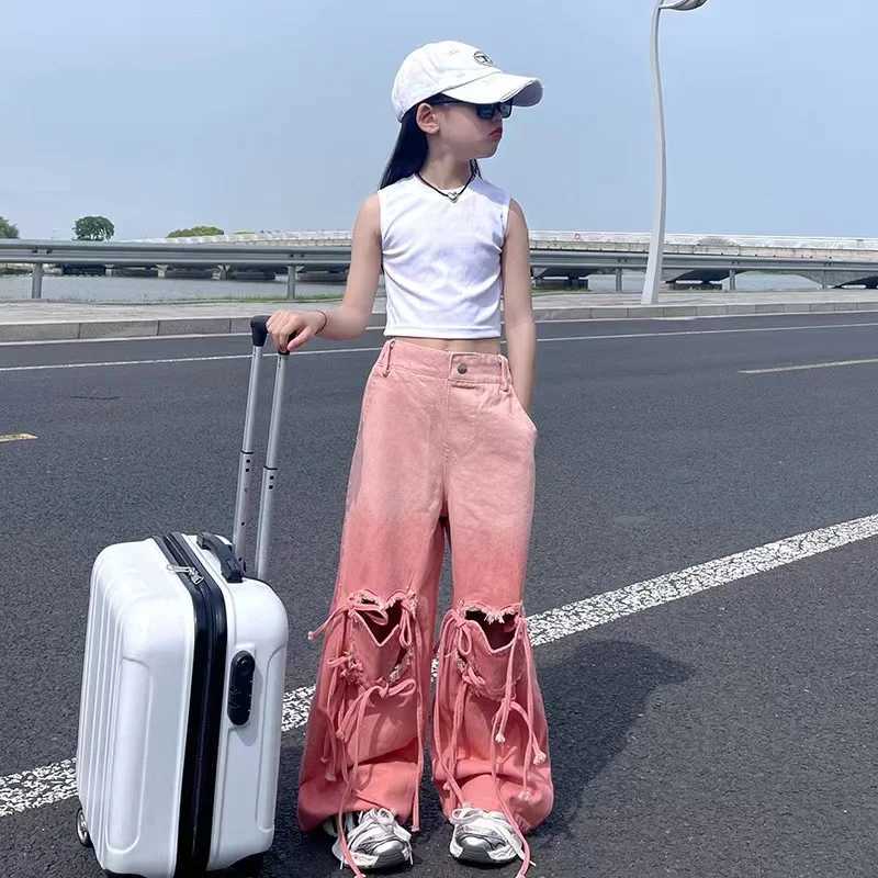 Girl pink jeans Korean heart-shaped hollow bag bandage denim Trouser childrens wide jeans retro fashion version clothingT250326