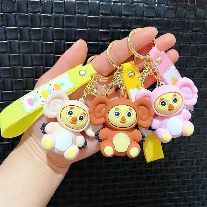 Cheburashkas monkey keychain cartoon animal doll car keychain backpack pendant decoration childrens education Christmas giftXJ250319