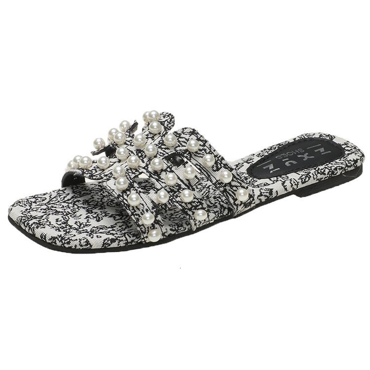 Sexy Flat Sandals 2025 Summer New Designer Sandals Fashionable And Simple Straight Pearl Fairy Style Open Toe Beach Slippers