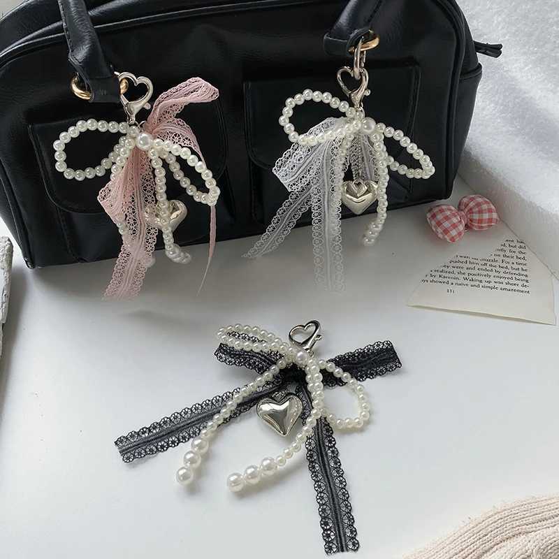 2024 New Sweet Pearl Bow Keychain Heart shaped Lace Pendant Car Keychain Korean Y2K Beauty Bag Pendant Accessories Gift 1PCXJ250319