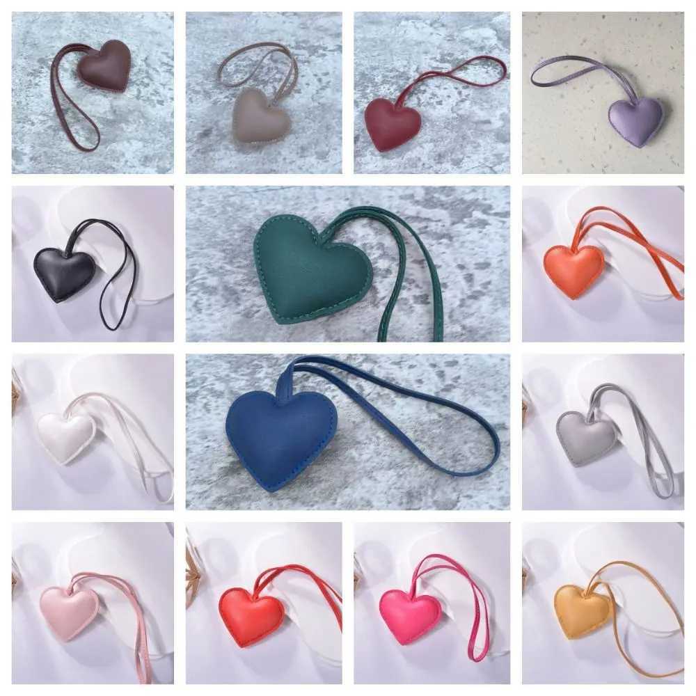 Multi colored PU leather heart-shaped keychain car keychain love PU leather clothes hanger cartoon fashion bag pendant bag decorationXJ250319